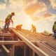 5J Building -Melbourne-House-Building-construction-workers-building-a-roof-frame-against